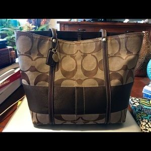 Coach medium size purse with rainbow interior